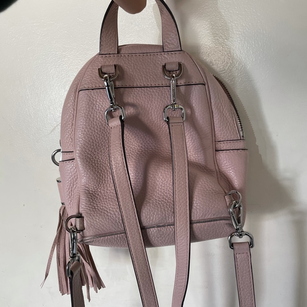 Michael Kors light pink studded mini backpack